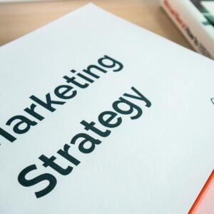 Close-up of a marketing strategy document on a desk, ideal for business content.